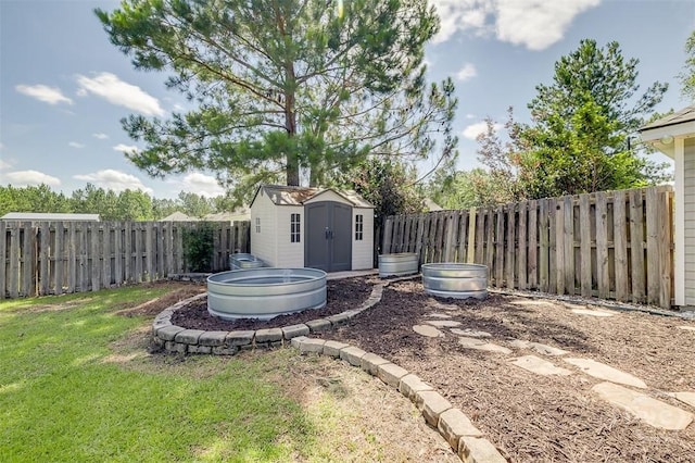 140 Abigail Cir, Ellabell, GA 31308 - fenced backyard featuring a storage shed
