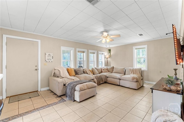 1072 Burtons Ferry Highway, Sylvania, GA 30467 - living room featuring light tile patterned floors, a ceiling fan, and ornamental molding
