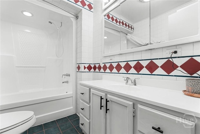 1072 Burtons Ferry Highway, Sylvania, GA 30467 - bathroom featuring vanity, tile patterned flooring, tub / shower combination, tile walls, and decorative backsplash