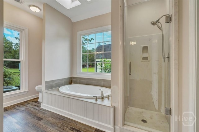 600 Old Louisville Rd, Guyton, GA 31312 - bathroom with a shower stall, plenty of natural light, wood finished floors, and a garden tub