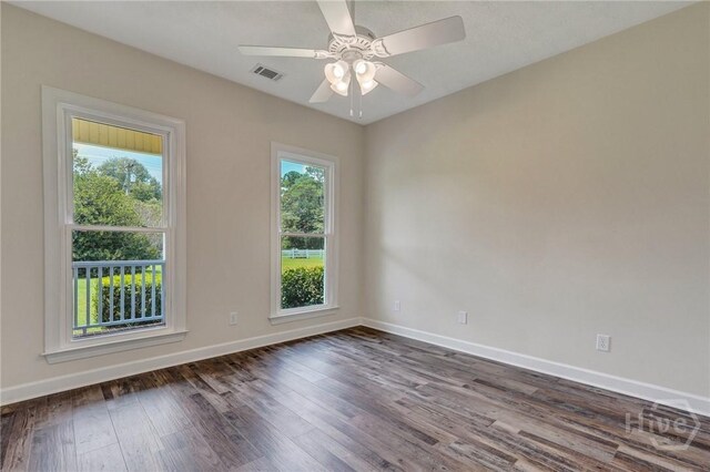 600 Old Louisville Rd, Guyton, GA 31312 - empty room with dark wood finished floors and ceiling fan