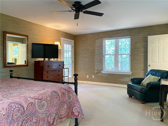 606 Dancy Ave, Savannah, GA 31419 - bedroom with carpet floors, wallpapered walls, and a ceiling fan
