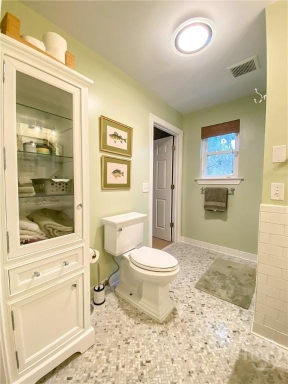 606 Dancy Ave, Savannah, GA 31419 - bathroom with toilet and baseboards