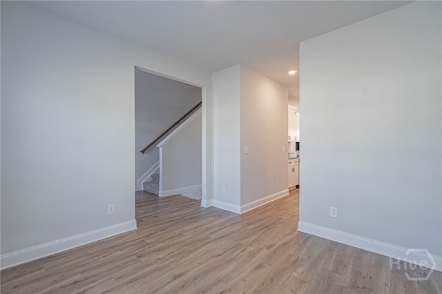 194 Gavin Way, Rincon, GA 31326 - spare room featuring recessed lighting, light wood-style floors, and stairway