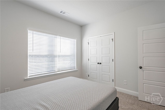194 Gavin Way, Rincon, GA 31326 - carpeted bedroom with a closet and baseboards