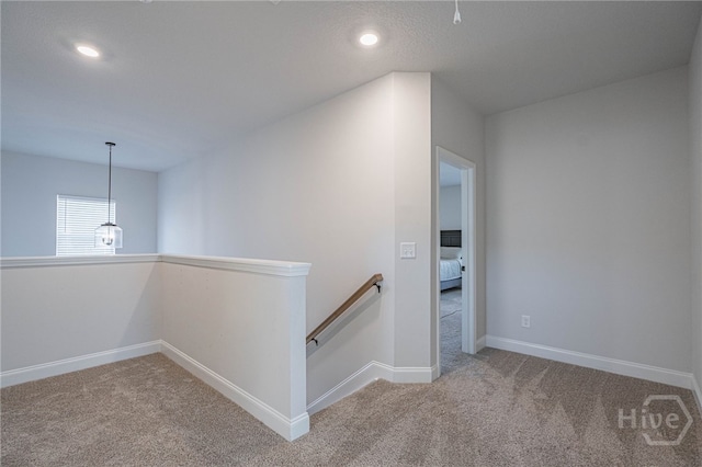 194 Gavin Way, Rincon, GA 31326 - hall featuring an upstairs landing, carpet floors, recessed lighting, and a chandelier
