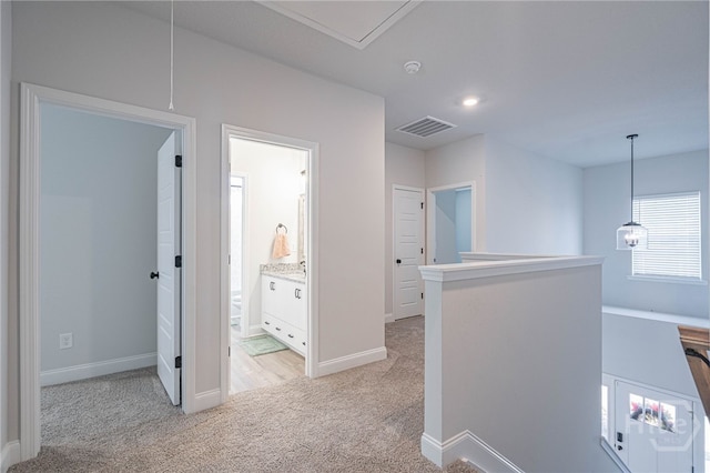 194 Gavin Way, Rincon, GA 31326 - hall with an upstairs landing, light colored carpet, recessed lighting, and attic access