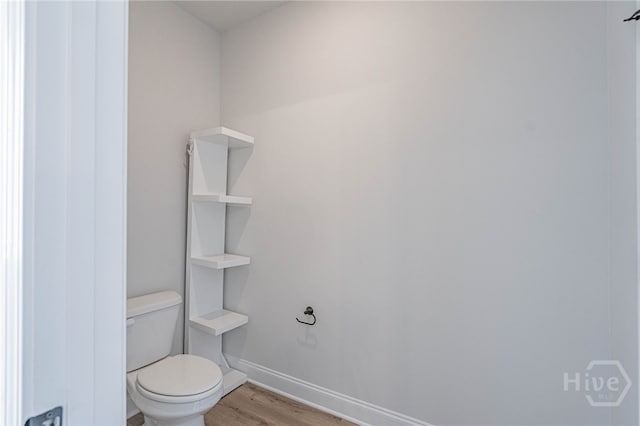 194 Gavin Way, Rincon, GA 31326 - bathroom featuring wood finished floors and baseboards