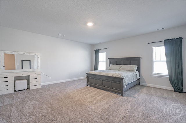 194 Gavin Way, Rincon, GA 31326 - carpeted bedroom featuring baseboards and a textured ceiling