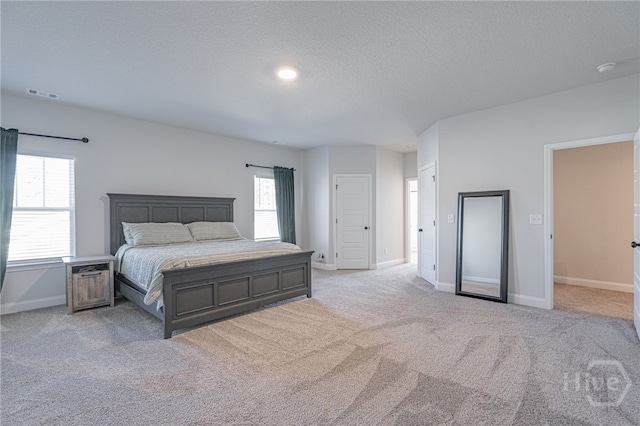194 Gavin Way, Rincon, GA 31326 - bedroom featuring light colored carpet and a textured ceiling