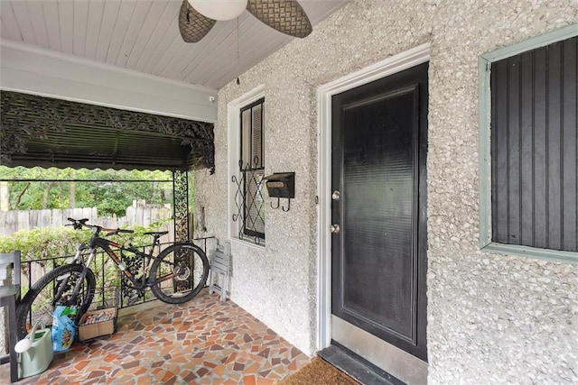 1025 W 40th St, Savannah, GA 31415 - entrance to property with stucco siding and a ceiling fan