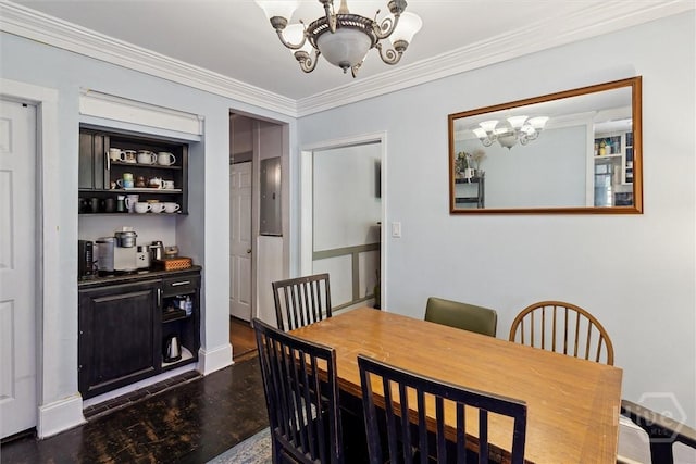 1025 W 40th St, Savannah, GA 31415 - dining space with a chandelier, crown molding, and wood finished floors