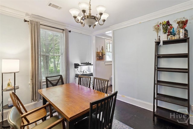 1025 W 40th St, Savannah, GA 31415 - dining space with a chandelier and ornamental molding