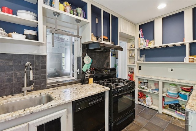 1025 W 40th St, Savannah, GA 31415 - kitchen with black appliances, open shelves, and backsplash