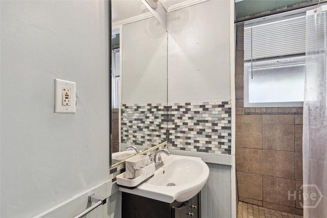 1025 W 40th St, Savannah, GA 31415 - bathroom with tile walls, vanity, and decorative backsplash