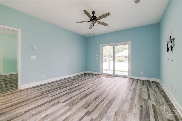 118 Plantation Way, Guyton, GA 31312 - spare room with wood finished floors and ceiling fan