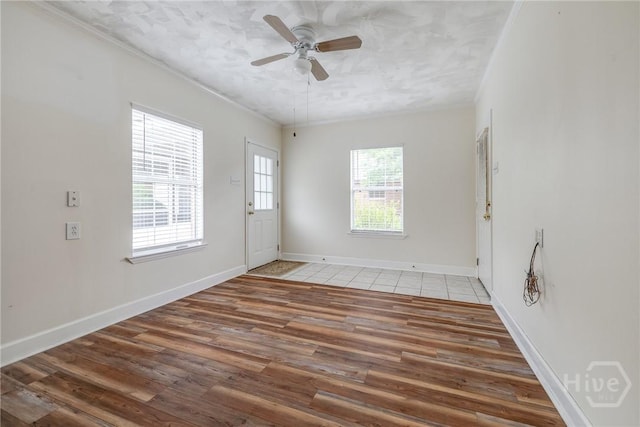 118 Plantation Way, Guyton, GA 31312 - spare room with wood finished floors, ceiling fan, and ornamental molding