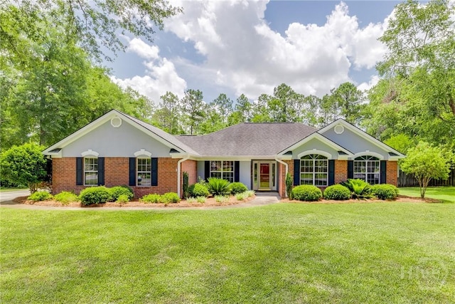 118 Plantation Way, Guyton, GA 31312 - ranch-style home with brick siding and a front yard
