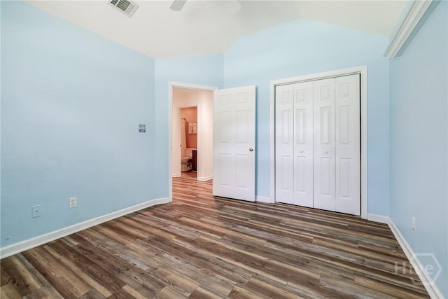 118 Plantation Way, Guyton, GA 31312 - unfurnished bedroom featuring lofted ceiling, dark wood-type flooring, a closet, and a ceiling fan