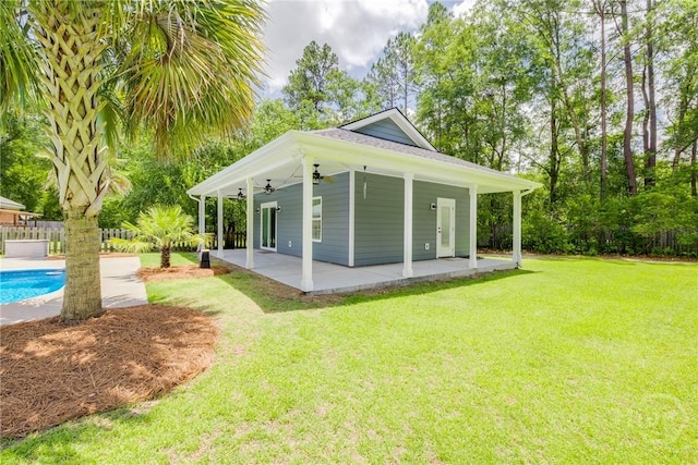 118 Plantation Way, Guyton, GA 31312 - rear view of property featuring ceiling fan, a patio, and an outdoor pool