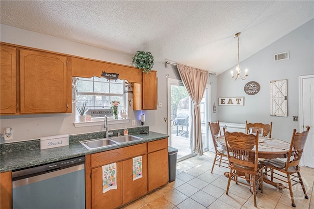 203 Deer Rd, Springfield, GA 31329 - kitchen with dishwasher, dark countertops, brown cabinets, light tile patterned floors, and a textured ceiling