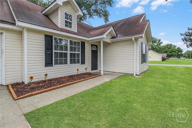 99 Dailey Dr, Guyton, GA 31312 - view of front of home featuring a front lawn and a shingled roof