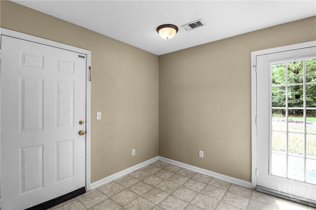99 Dailey Dr, Guyton, GA 31312 - doorway to outside featuring baseboards