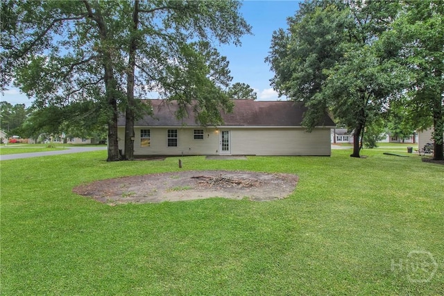 99 Dailey Dr, Guyton, GA 31312 - back of house with a yard