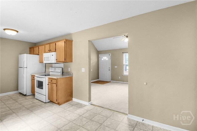 99 Dailey Dr, Guyton, GA 31312 - kitchen featuring white appliances, light countertops, light floors, light carpet, and ceiling fan