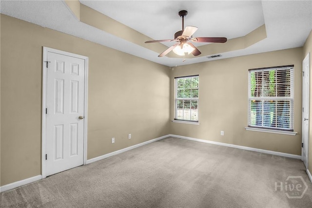 99 Dailey Dr, Guyton, GA 31312 - carpeted spare room with a ceiling fan and a tray ceiling