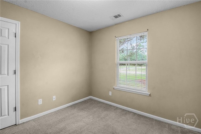 99 Dailey Dr, Guyton, GA 31312 - carpeted spare room featuring baseboards and a textured ceiling