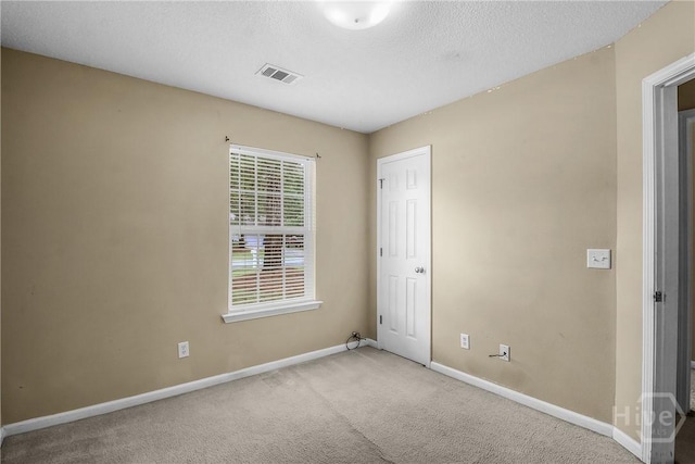 99 Dailey Dr, Guyton, GA 31312 - unfurnished bedroom with carpet flooring and a textured ceiling