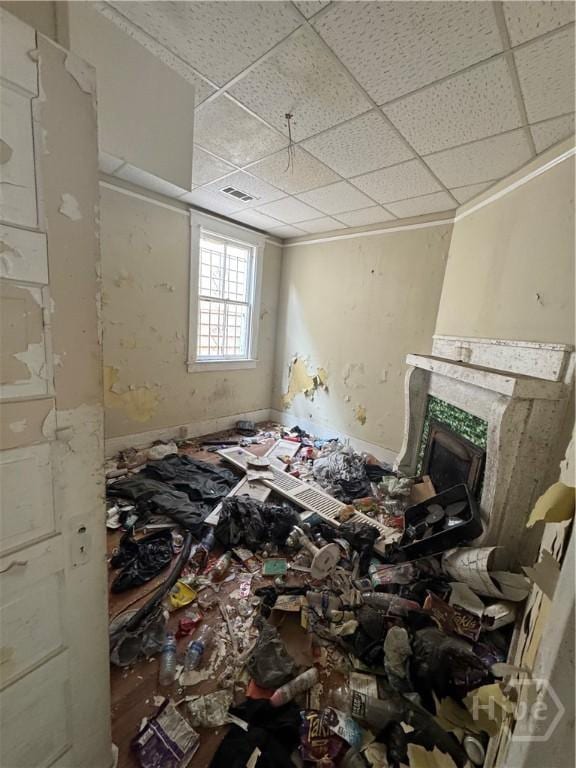 601 W 45th St, Savannah, GA 31405 - unfurnished room with a drop ceiling and a fireplace
