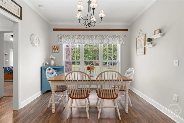2016 Pippin Pl, Statesboro, GA 30461 - dining area featuring dark wood-style flooring, crown molding, and a chandelier