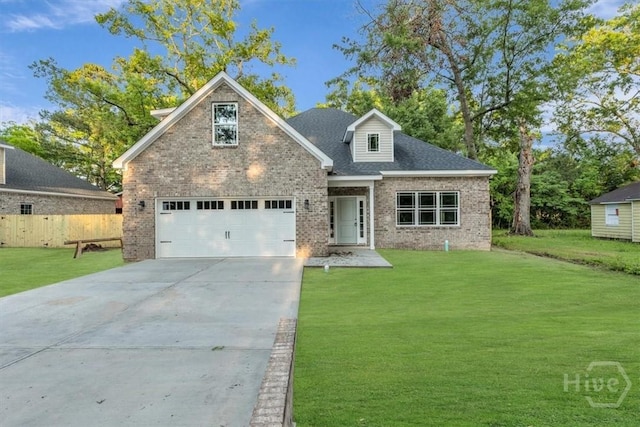 135 Houston St, Pooler, GA 31322 - view of front of home featuring brick siding, driveway, and a garage