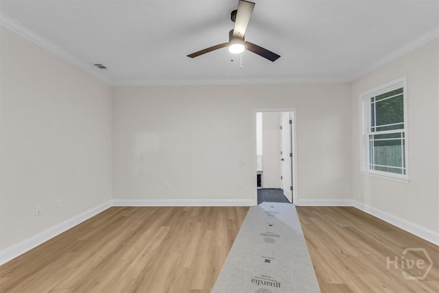 135 Houston St, Pooler, GA 31322 - empty room with ornamental molding, light wood finished floors, and ceiling fan
