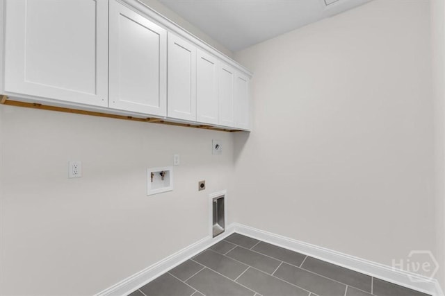135 Houston St, Pooler, GA 31322 - washroom with cabinet space, hookup for an electric dryer, washer hookup, and dark tile patterned floors