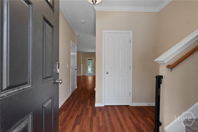98 Peregrine Cir, Richmond Hill, GA 31324 - entrance foyer with dark wood-style floors, ornamental molding, and stairway