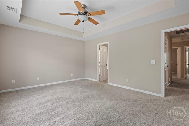 98 Peregrine Cir, Richmond Hill, GA 31324 - carpeted spare room featuring ceiling fan, a raised ceiling, and attic access