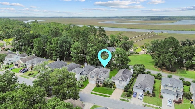 98 Peregrine Cir, Richmond Hill, GA 31324 - aerial view of residential area with a nearby body of water