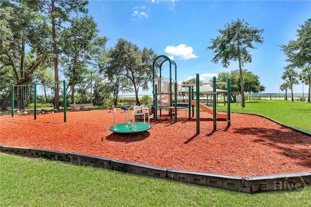 98 Peregrine Cir, Richmond Hill, GA 31324 - community play area featuring a lawn
