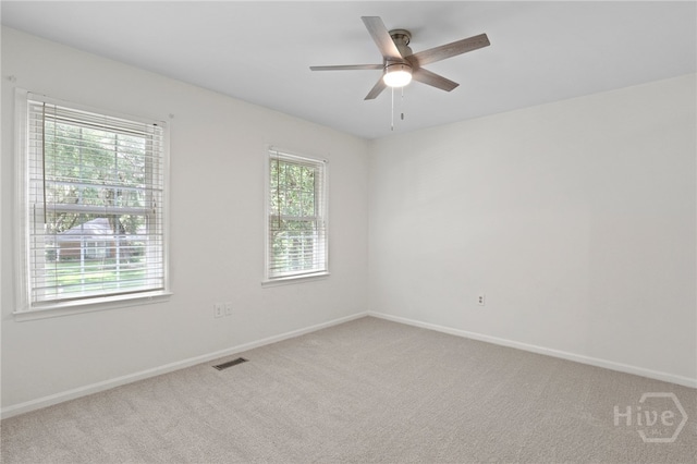 103 Olde Towne Rd, Savannah, GA 31410 - empty room with light carpet and ceiling fan