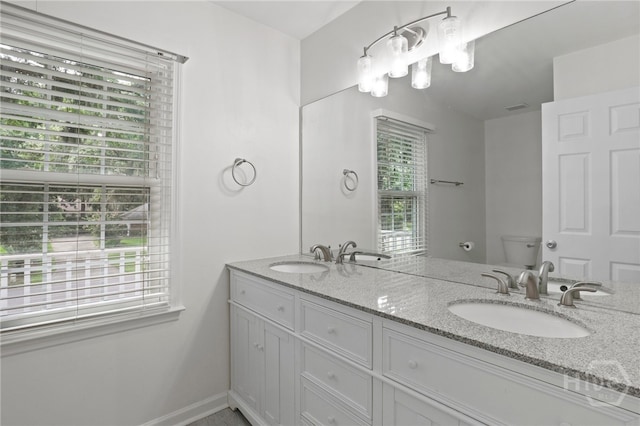 103 Olde Towne Rd, Savannah, GA 31410 - bathroom featuring double vanity and healthy amount of natural light