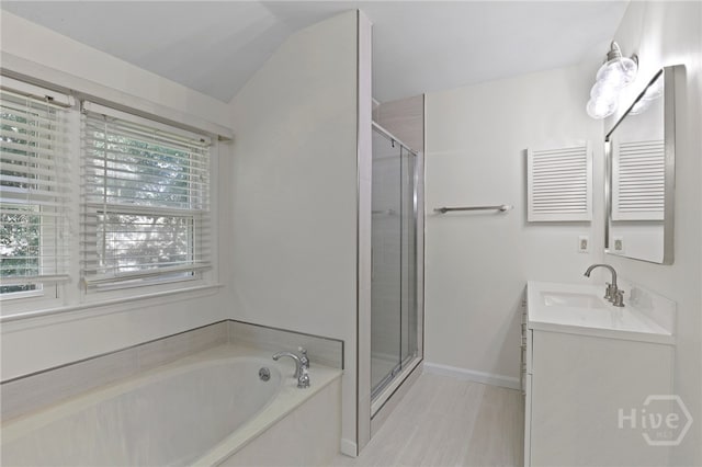 103 Olde Towne Rd, Savannah, GA 31410 - full bath with vanity, a garden tub, and a stall shower
