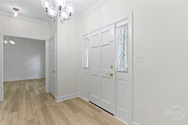 103 Olde Towne Rd, Savannah, GA 31410 - foyer entrance with a chandelier, ornamental molding, and light wood finished floors