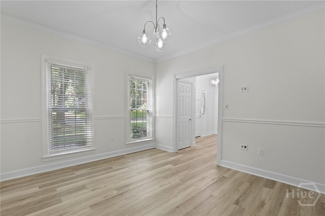 103 Olde Towne Rd, Savannah, GA 31410 - empty room with a chandelier, light wood-style flooring, and ornamental molding
