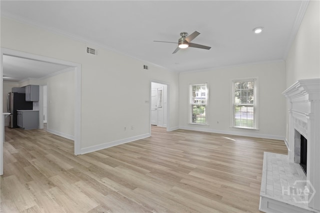 103 Olde Towne Rd, Savannah, GA 31410 - unfurnished living room with ceiling fan, ornamental molding, light wood-style floors, and a fireplace
