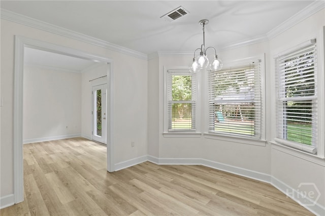 103 Olde Towne Rd, Savannah, GA 31410 - unfurnished dining area featuring a chandelier, light wood finished floors, and crown molding