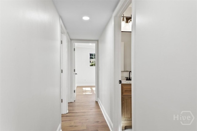 4630 Herty Dr, Savannah, GA 31405 - hallway featuring light wood-style flooring and recessed lighting
