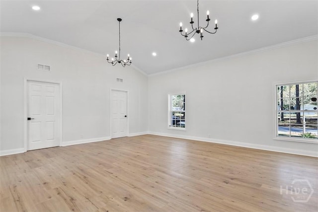 4630 Herty Dr, Savannah, GA 31405 - unfurnished living room with a chandelier, light wood-type flooring, crown molding, high vaulted ceiling, and recessed lighting